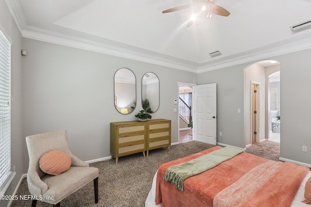 1494 Walnut Creek Dr, Fleming Island, FL 32003 - bedroom with arched walkways, carpet flooring, ornamental molding, multiple windows, and ceiling fan