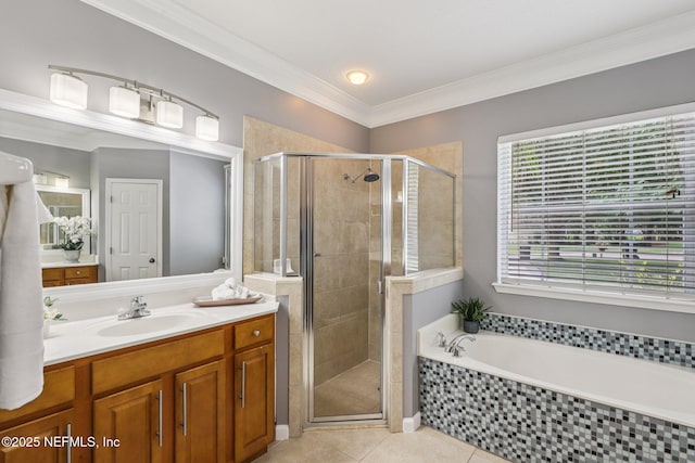 1494 Walnut Creek Dr, Fleming Island, FL 32003 - bathroom featuring vanity, tile patterned floors, a garden tub, a shower stall, and ornamental molding