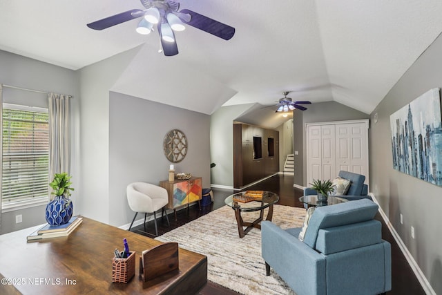 1494 Walnut Creek Dr, Fleming Island, FL 32003 - living area featuring a ceiling fan, lofted ceiling, and wood finished floors