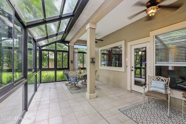 1494 Walnut Creek Dr, Fleming Island, FL 32003 - sunroom with ceiling fan, vaulted ceiling, and outdoor dining area