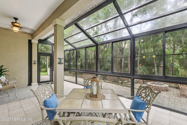 1494 Walnut Creek Dr, Fleming Island, FL 32003 - sunroom / solarium featuring a ceiling fan and outdoor dining area