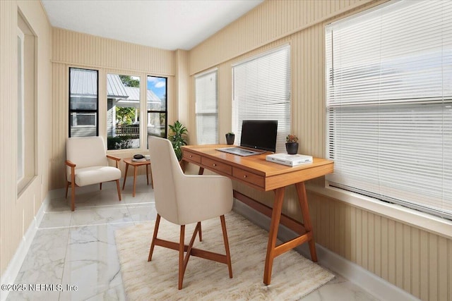 office featuring marble finish floor and baseboards