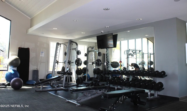 workout area featuring a wealth of natural light and recessed lighting