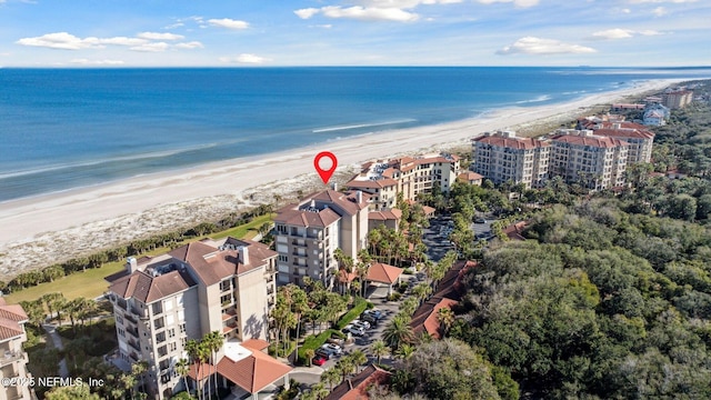 aerial view featuring a water view and a view of the beach