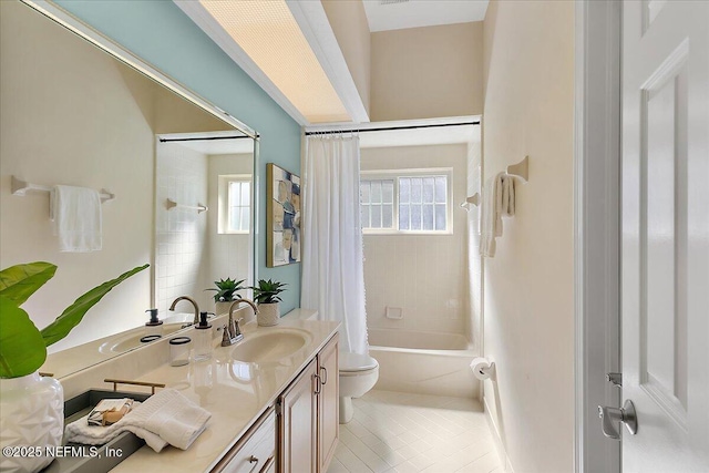 full bath with toilet, shower / tub combo, vanity, and tile patterned floors