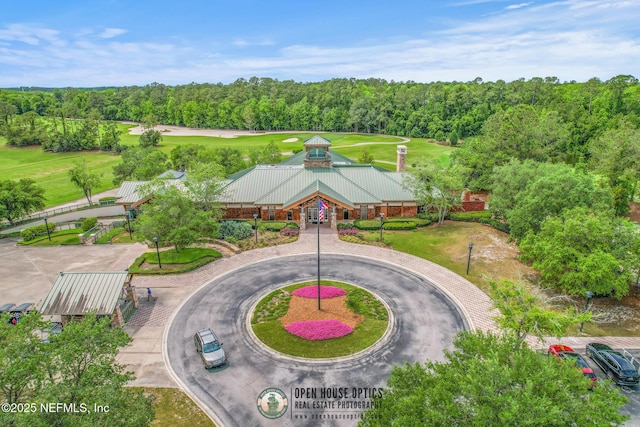 aerial view with a wooded view