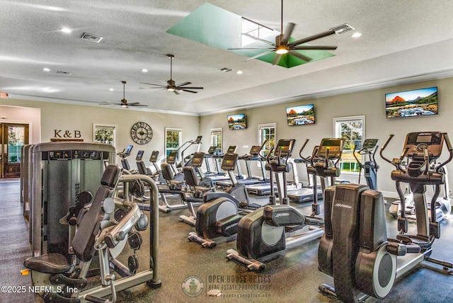 workout area with recessed lighting, visible vents, and a textured ceiling