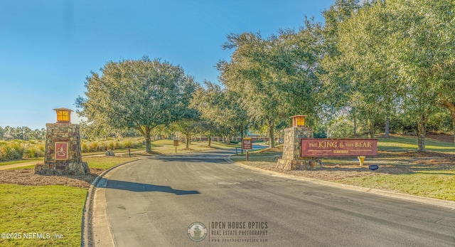 view of road featuring curbs