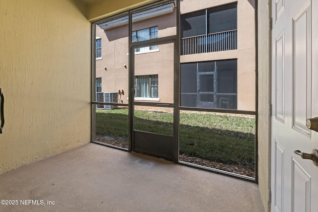 view of unfurnished sunroom