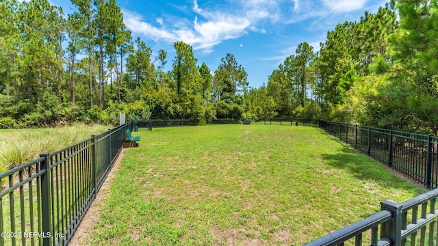 view of yard with fence