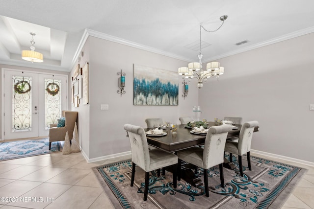 986 Prairie Dunes Ct, Orange Park, FL 32065 - dining room with light tile patterned floors, visible vents, baseboards, ornamental molding, and a notable chandelier