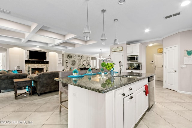 986 Prairie Dunes Ct, Orange Park, FL 32065 - kitchen featuring visible vents, a sink, open floor plan, and appliances with stainless steel finishes