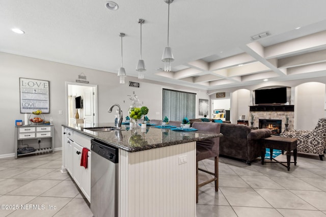 986 Prairie Dunes Ct, Orange Park, FL 32065 - kitchen featuring light tile patterned flooring, coffered ceiling, a sink, stainless steel dishwasher, and visible vents