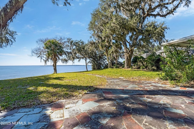 view of yard with a water view