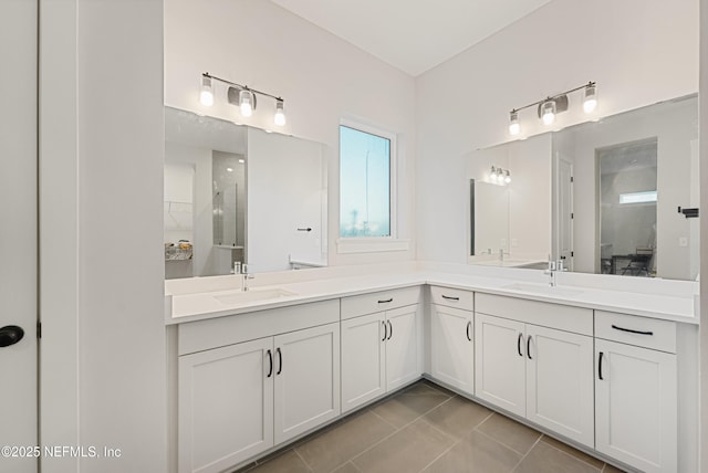 full bath with tile patterned flooring and vanity