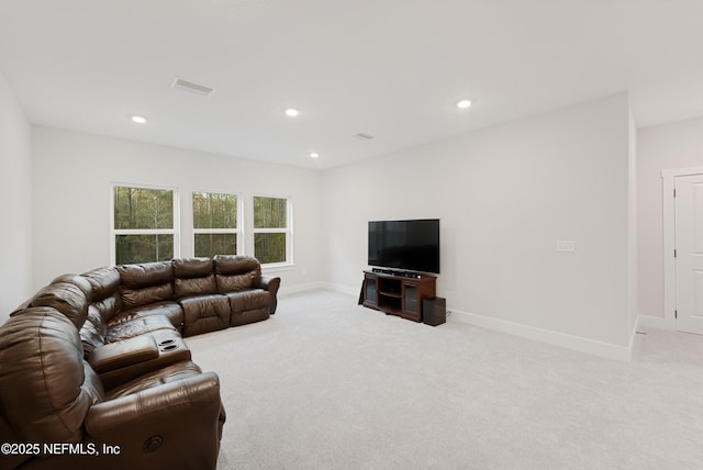 living area featuring light carpet, baseboards, visible vents, and recessed lighting