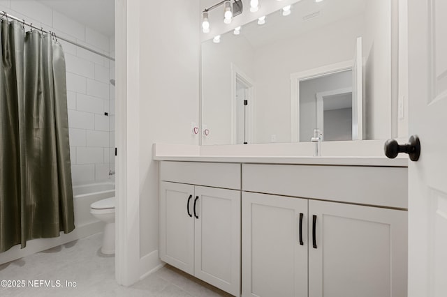 full bath with tile patterned flooring, toilet, visible vents, vanity, and shower / tub combo with curtain