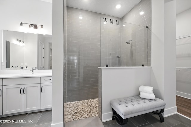 152 Navigators Rd, Saint Johns, FL 32259 - bathroom with baseboards, walk in shower, vanity, and tile patterned flooring