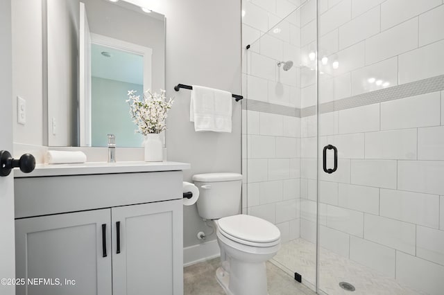 152 Navigators Rd, Saint Johns, FL 32259 - bathroom with a shower stall, tile patterned floors, toilet, vanity, and baseboards