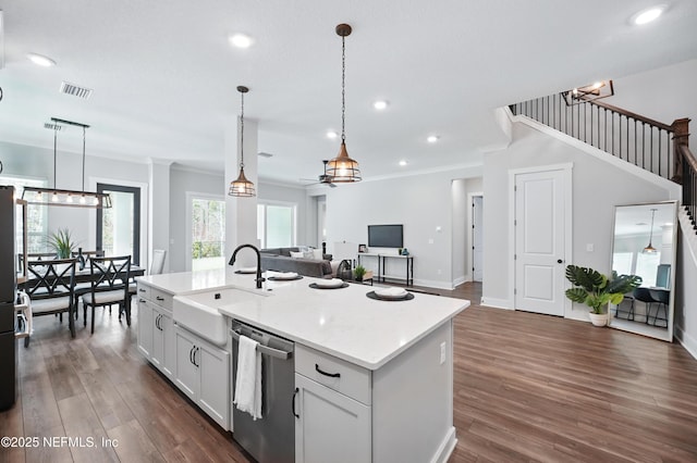 152 Navigators Rd, Saint Johns, FL 32259 - kitchen featuring stainless steel dishwasher, a sink, dark wood-style flooring, open floor plan, and visible vents
