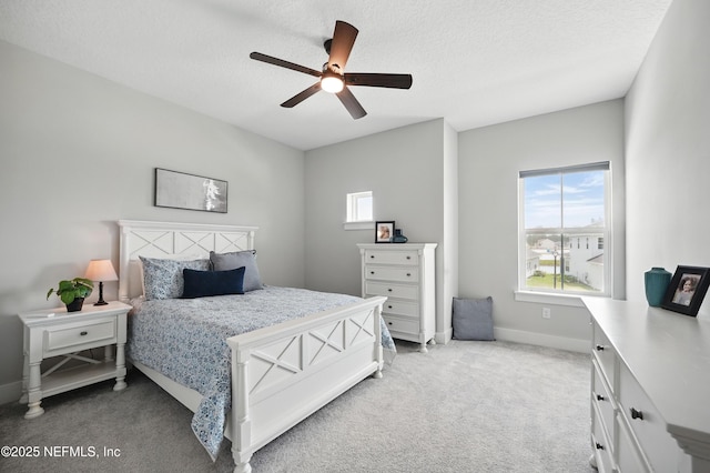 152 Navigators Rd, Saint Johns, FL 32259 - bedroom with light carpet, a ceiling fan, a textured ceiling, and baseboards