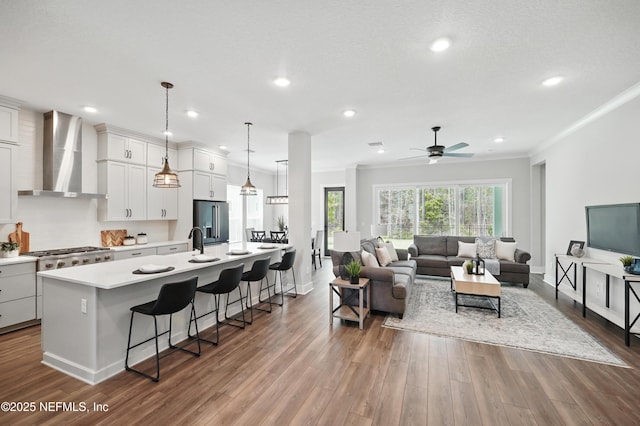 152 Navigators Rd, Saint Johns, FL 32259 - living room with baseboards, recessed lighting, wood finished floors, ceiling fan, and crown molding