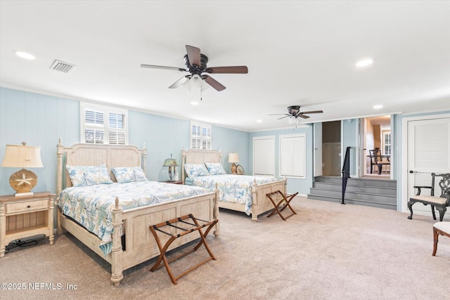 carpeted bedroom with visible vents, crown molding, and recessed lighting