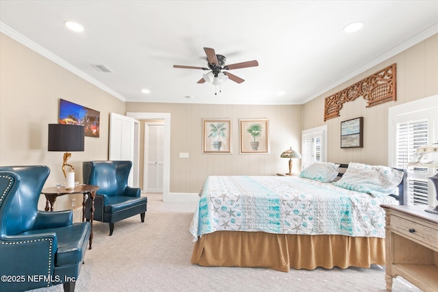 bedroom featuring recessed lighting, visible vents, crown molding, and light colored carpet