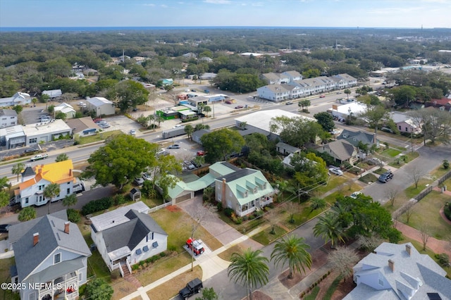 birds eye view of property with a residential view