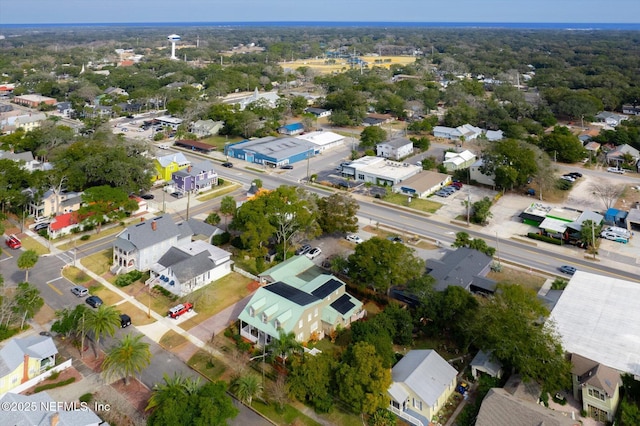 birds eye view of property with a residential view