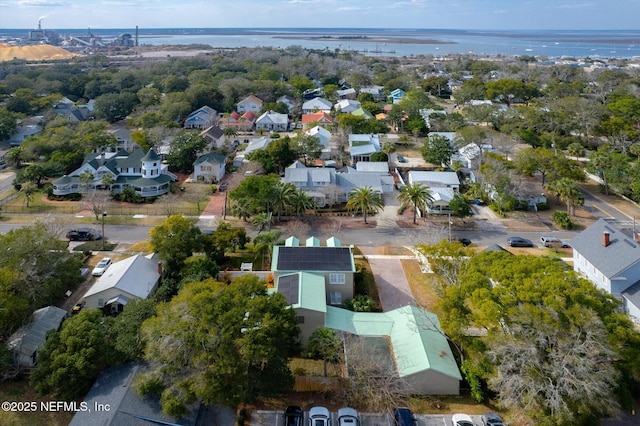 birds eye view of property featuring a residential view and a water view