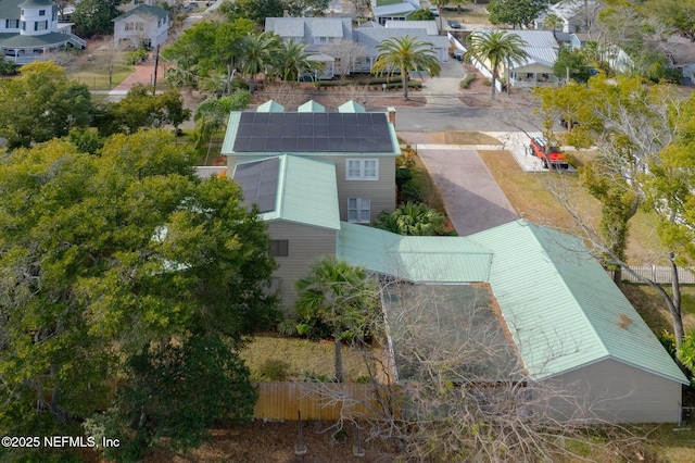 birds eye view of property with a residential view