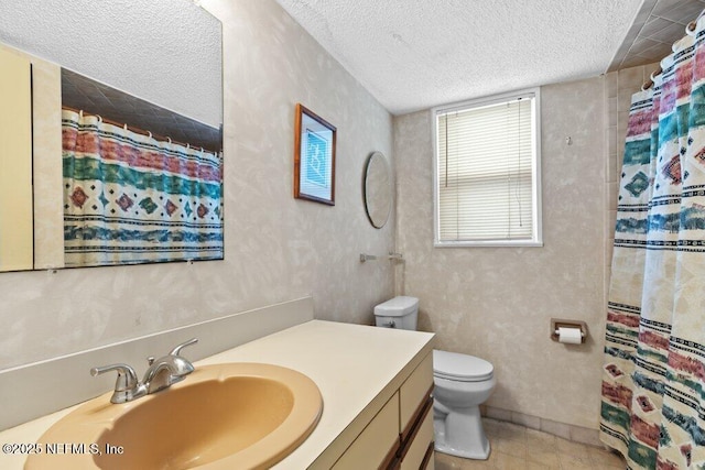 full bathroom with a textured ceiling, toilet, vanity, a shower with curtain, and tile patterned floors