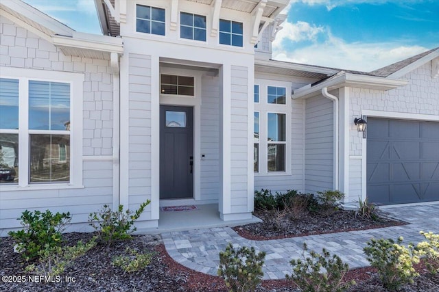 entrance to property with an attached garage