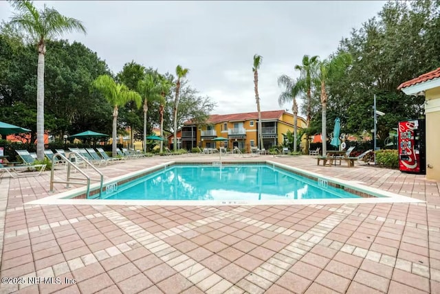 community pool featuring a patio