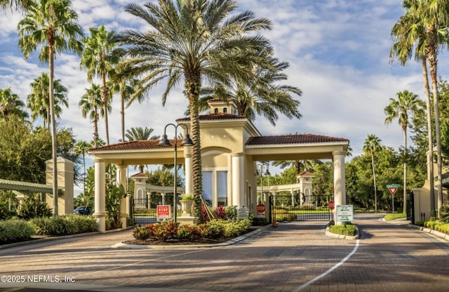 surrounding community featuring a gate