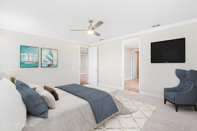 bedroom with visible vents, ornamental molding, a ceiling fan, light carpet, and baseboards