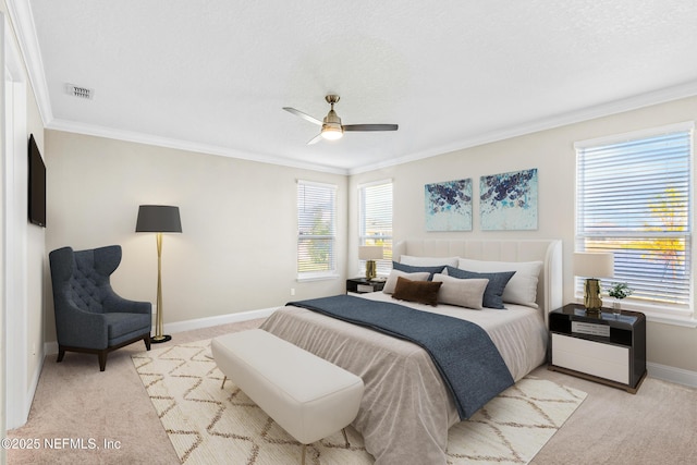 bedroom featuring a textured ceiling, light colored carpet, visible vents, baseboards, and crown molding