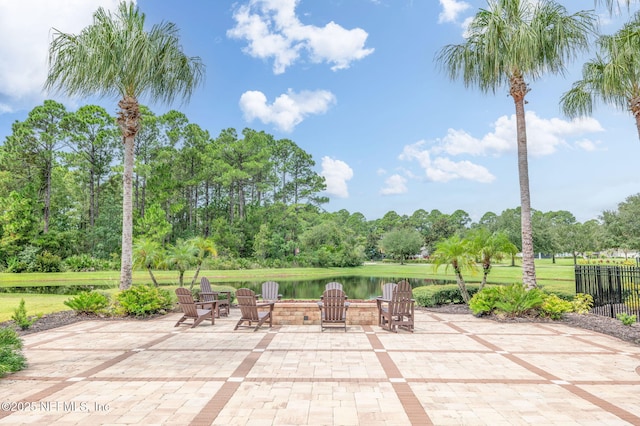 view of patio featuring a water view