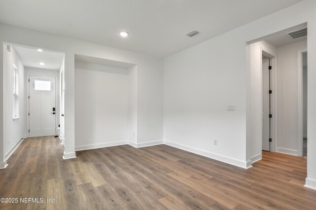 950 Lightsey Crossing Ln, Saint Augustine, FL 32084 - unfurnished room featuring baseboards, dark wood finished floors, and visible vents