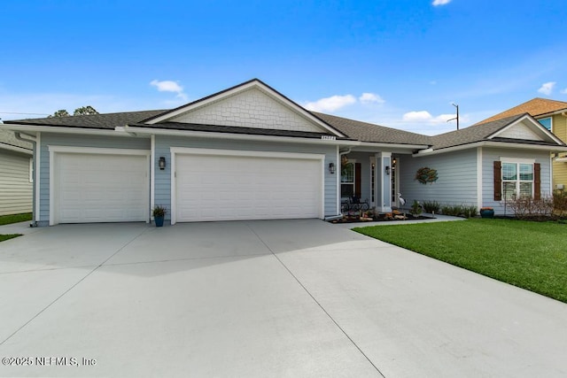 34072 Lavender Parke Dr, Fernandina Beach, FL 32034 - ranch-style house with a garage, driveway, and a front lawn