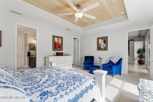 34072 Lavender Parke Dr, Fernandina Beach, FL 32034 - bedroom with wooden ceiling, visible vents, a tray ceiling, and light colored carpet
