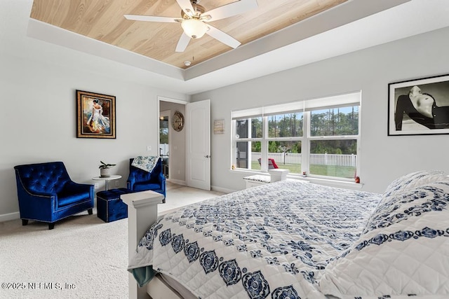 34072 Lavender Parke Dr, Fernandina Beach, FL 32034 - bedroom with light colored carpet, a ceiling fan, baseboards, wood ceiling, and a tray ceiling