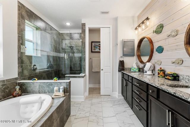 34072 Lavender Parke Dr, Fernandina Beach, FL 32034 - bathroom featuring double vanity, visible vents, baseboards, marble finish floor, and a walk in shower