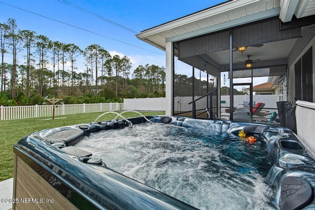 34072 Lavender Parke Dr, Fernandina Beach, FL 32034 - wooden deck with a sunroom, a fenced backyard, a yard, and a hot tub