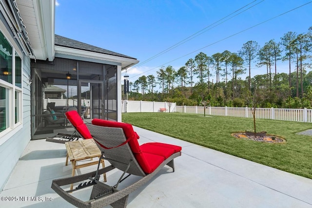 34072 Lavender Parke Dr, Fernandina Beach, FL 32034 - view of patio / terrace with a sunroom and a fenced backyard