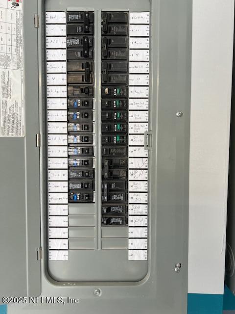 34072 Lavender Parke Dr, Fernandina Beach, FL 32034 - utility room featuring electric panel