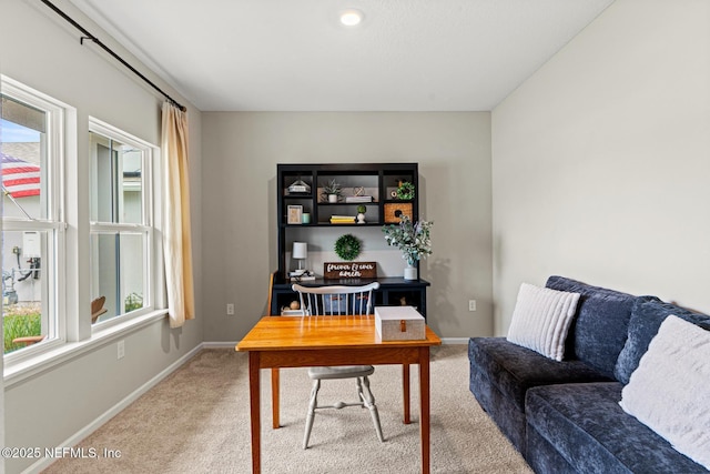 office space with carpet floors and baseboards