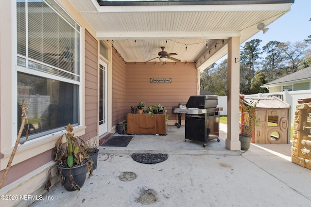 view of patio featuring a grill and ceiling fan