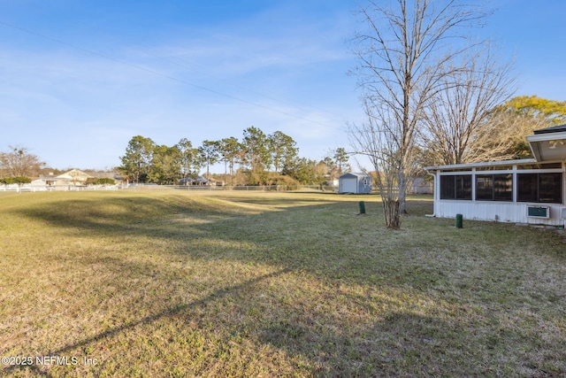 view of yard featuring a sunroom